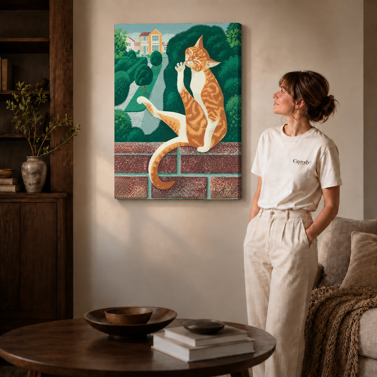 Garden tabby canvas art on unframed wrapped canvas, showing natural edge depth against the living room wall.