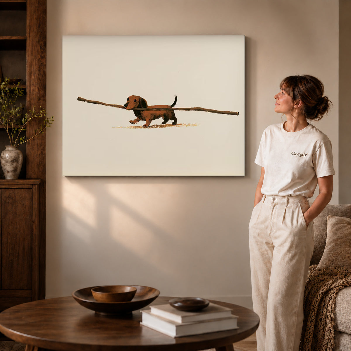 Gallery wrapped dachshund canvas art showing dimensional edges and soft shadows in a living room.