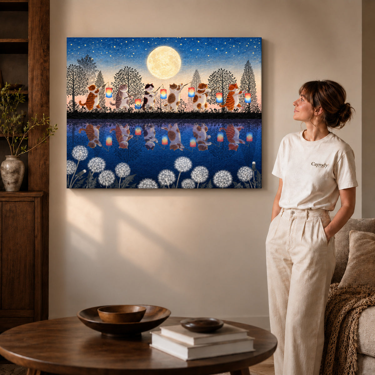 Gallery wrapped lantern cat canvas art showing dimensional edges and soft shadows in a living room.