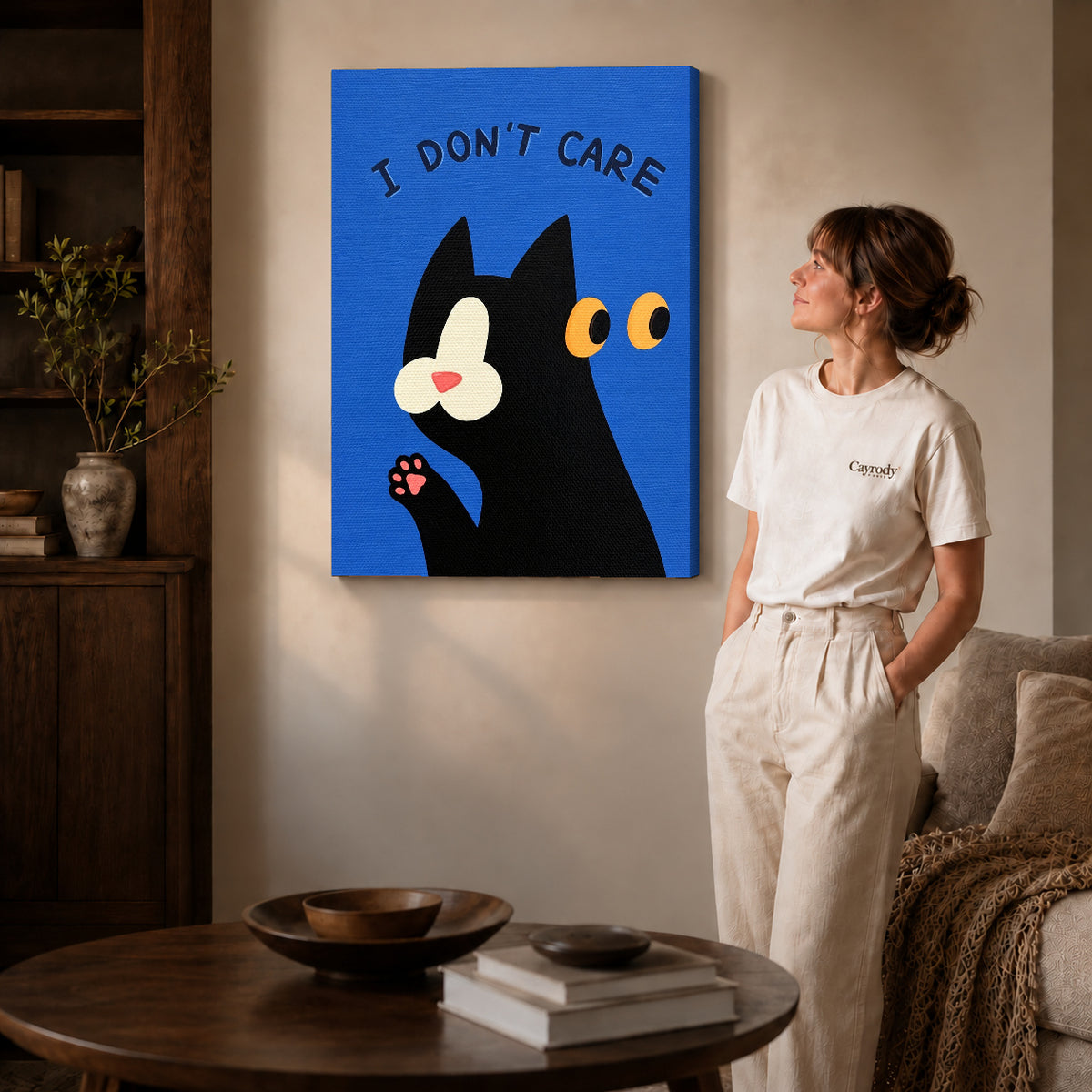 Gallery wrapped unbothered cat canvas art showing dimensional edges and soft shadows in a living room.