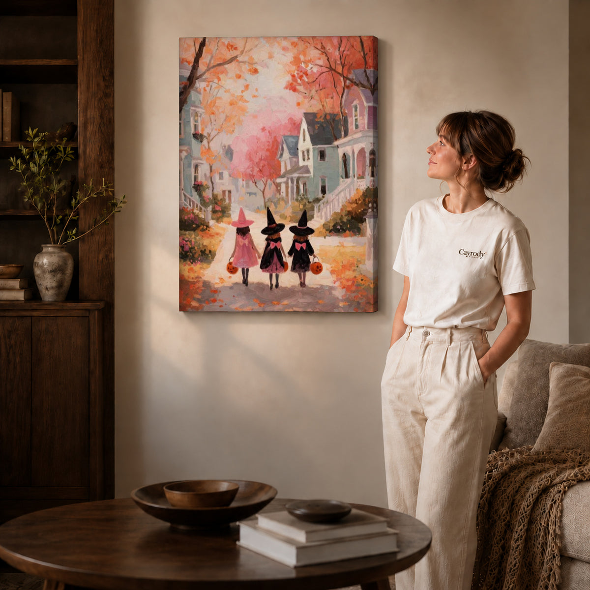 Little witches canvas art shown in the gallery-wrapped option with visible depth and warm surroundings.
