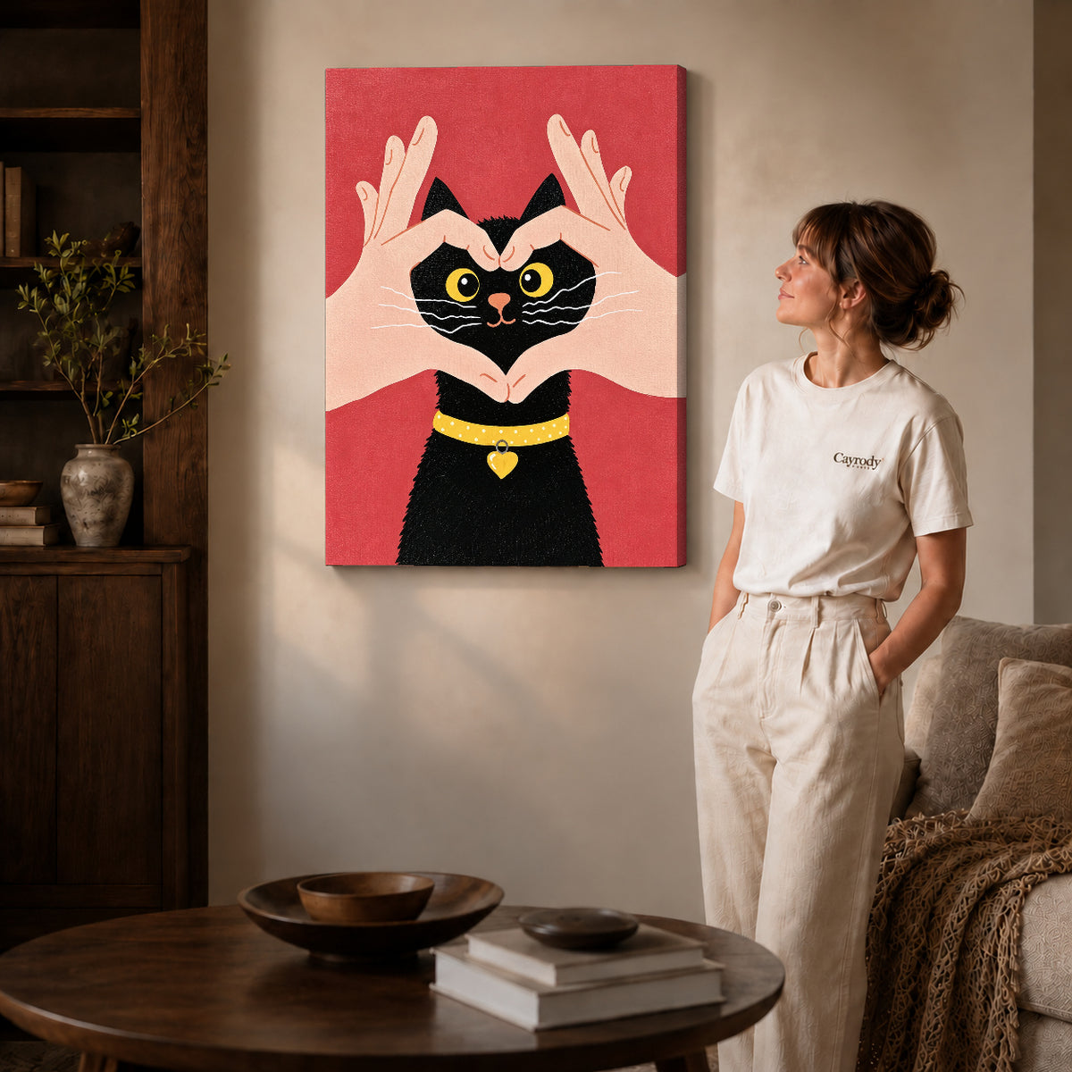 Heart kitten canvas art shown in the gallery-wrapped option with visible depth and warm surroundings.