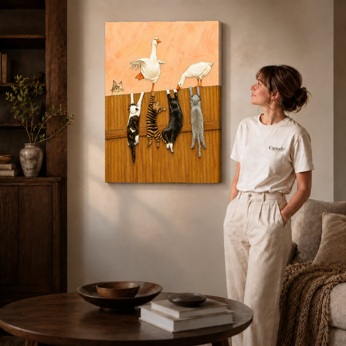 Geese and cats canvas art shown in the gallery-wrapped option with visible depth and warm surroundings.