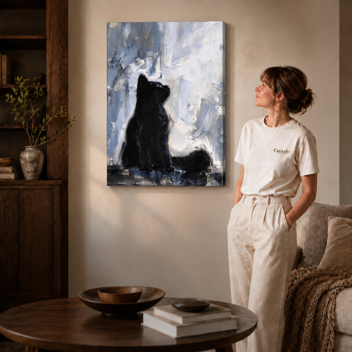 quiet black kitten canvas art shown in the gallery-wrapped option with visible depth and warm surroundings.