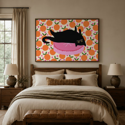 Black cat orange citrus pattern graphic canvas wall art displayed above cozy neutral bedroom headboard