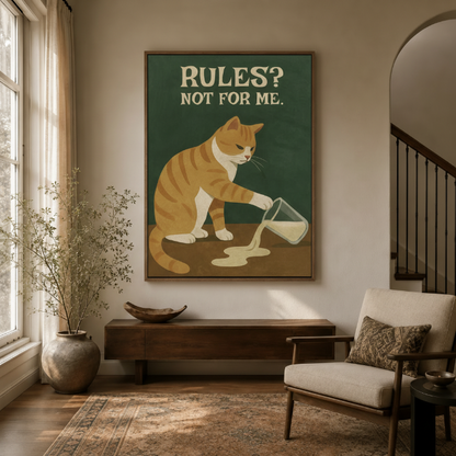 Humorous retro cat wall art in dark walnut frame styled in a warm neutral entryway with dried branches