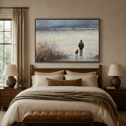 Man and dog canvas print above a wooden bed in a warm rustic bedroom with linen bedding