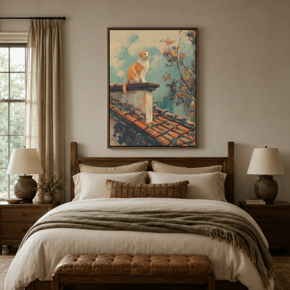 Vintage orange cat rooftop canvas wall art in dark frame displayed above bed in cozy bedroom