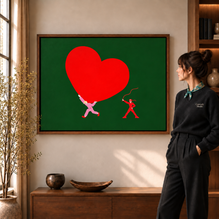 Red heart canvas wall art in a walnut frame in black near a window.