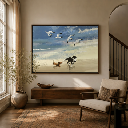 Impressionist dogs on beach canvas print hanging in warm entryway with walnut console and dried branches