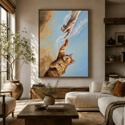 Orange tabby cat reaching toward divine hand in Michelangelo parody canvas above living room sofa