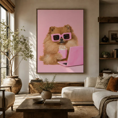 Large pink Pomeranian wall art in floater frame displayed above a white sofa in a boho living room