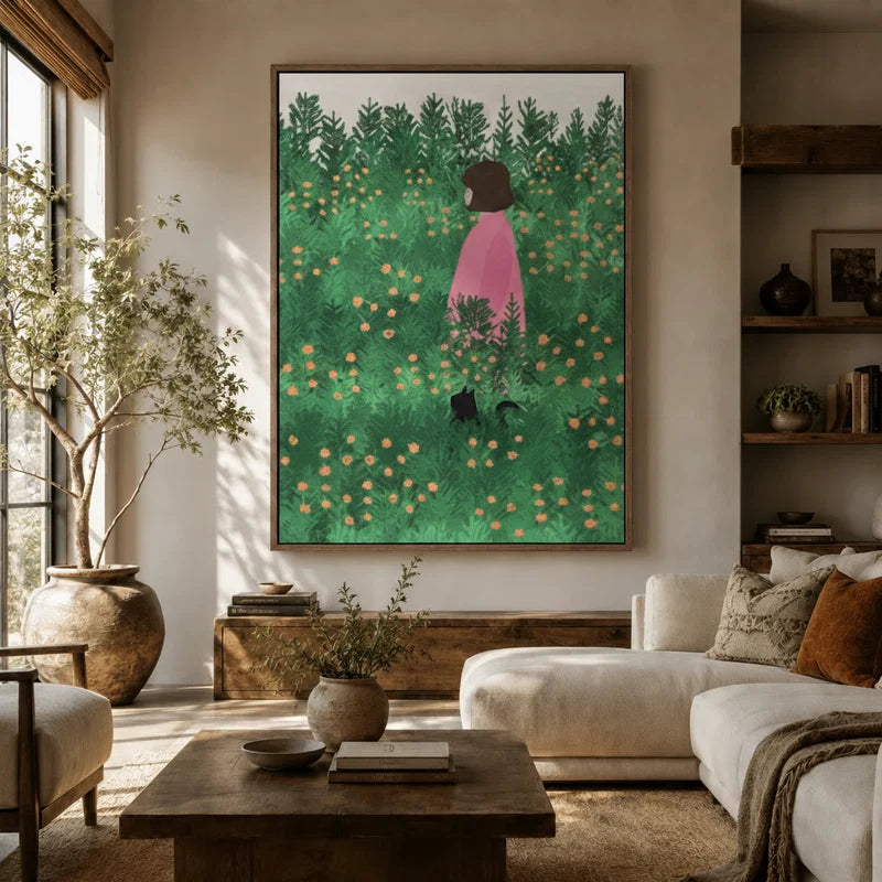 Large botanical girl and cat meadow canvas above sofa in earthy boho living room with olive tree