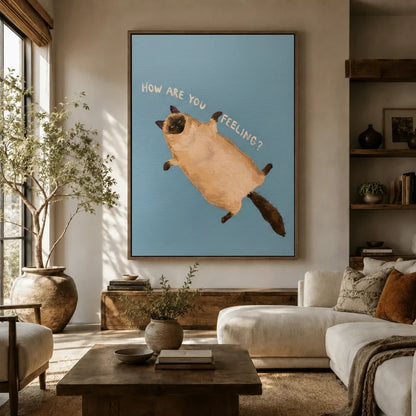 Large funny cat canvas above sofa in bright boho living room, Siamese cat with How Are You Feeling text