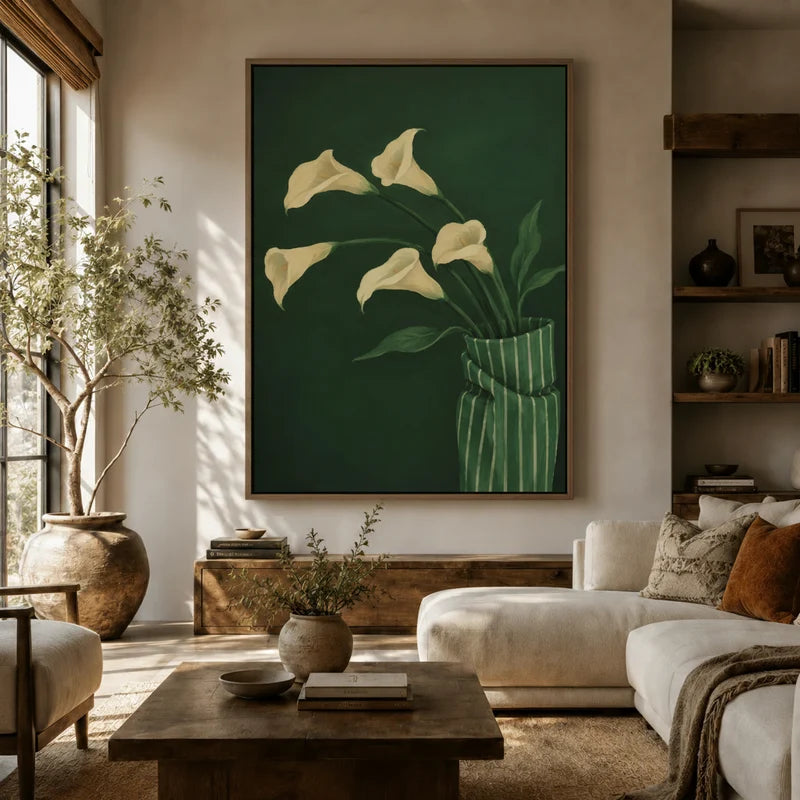 Dark green calla lily floral wall art above sofa in a cozy boho living room with wood coffee table and shelving