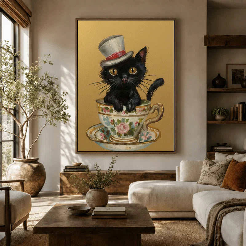 Large vintage cat wall art in floater frame above a white sofa in a sunlit boho living room