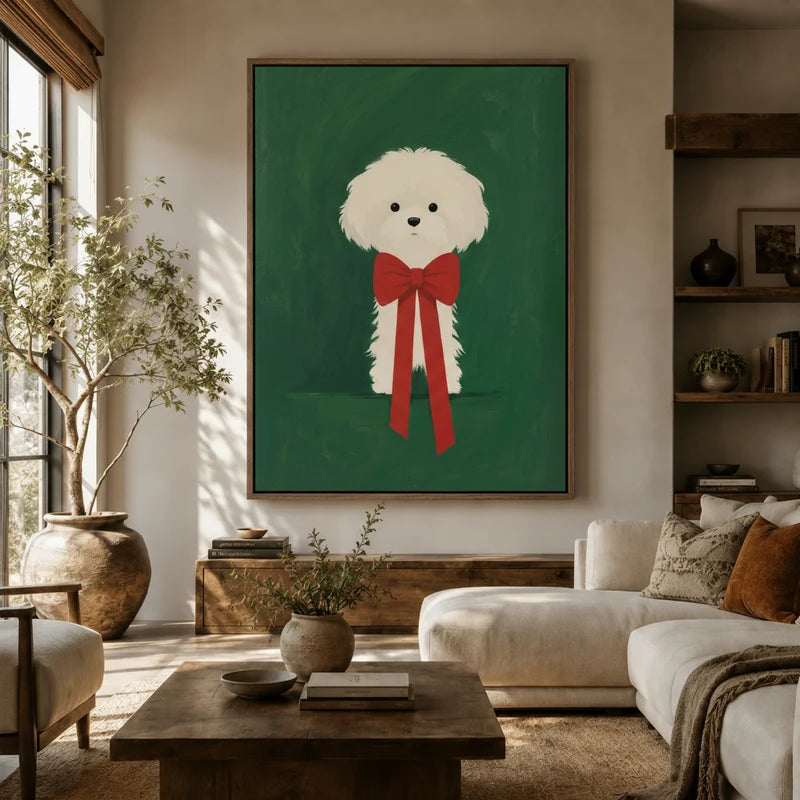 White fluffy dog red bow wall art hanging above sofa in a bright boho living room with wood shelves