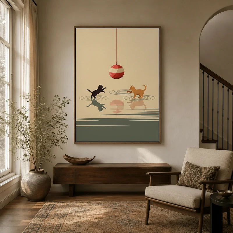 Framed minimalist two cats playing ball canvas wall art in warm neutral entryway with arched doorway