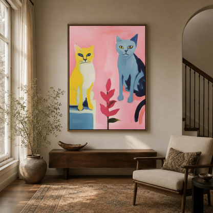 Vibrant two cats pink pop art canvas in dark walnut frame styled in a warm neutral entryway