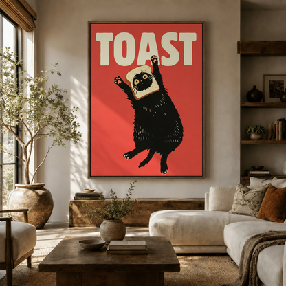 Large retro pop art black cat canvas above a cream sofa in a bright modern living room with natural light