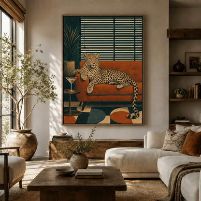 Mid-century leopard canvas wall art displayed above console table in warm neutral living room
