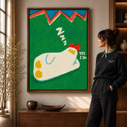 Sleeping chicken canvas art with a green background in a walnut frame beside a woman wearing a scarf.