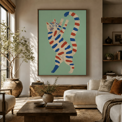 Bold blue and red striped cat canvas print displayed above a white sofa in a warm boho living room