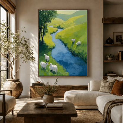 Large pastoral landscape wall art with grazing sheep hung in a Scandinavian living room