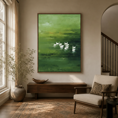 Green impressionist geese wall art in float frame hanging in entryway with staircase and arched doorway