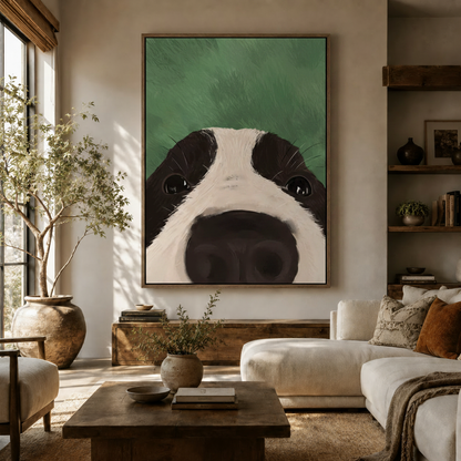 Bold dog portrait canvas hanging above living room console in earthy green and black tones