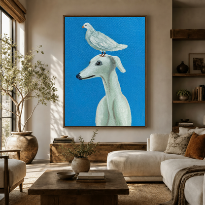 Contemporary greyhound canvas art framed on living room wall beside white sofa and olive tree