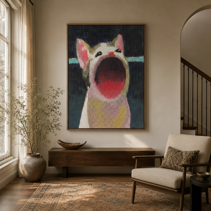 Funny screaming cat wall art in natural wood frame hung in a neutral entryway with console and chair