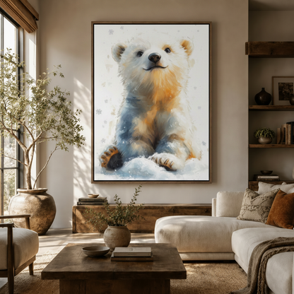 Baby polar bear canvas wall art hung above white sofa in bright boho living room with natural light