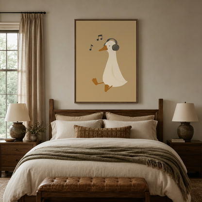 Whimsical duck headphones print in thin brown float frame centered above bed in a cozy warm-toned bedroom