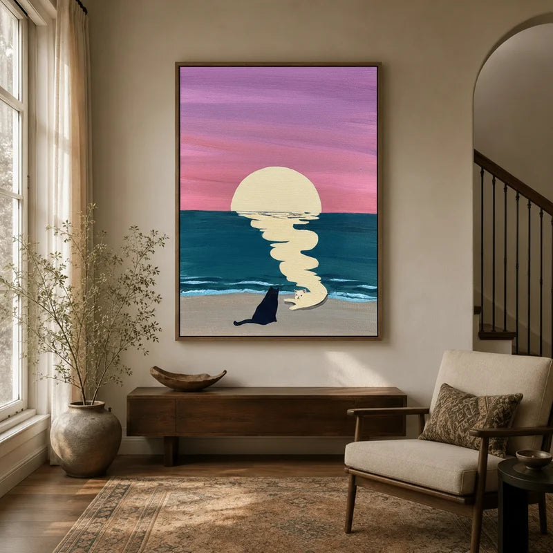 Framed black and white cats sunset beach canvas wall art displayed in a warm neutral entryway with wood console