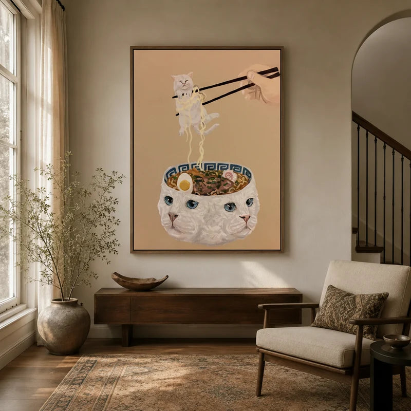 Oversized funny cat canvas wall art hung in a bright entryway beside a wood console and accent chair
