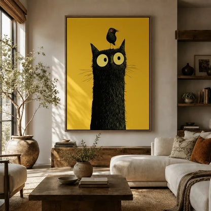 Oversized whimsical black cat with bird canvas wall art above sofa in bright boho living room
