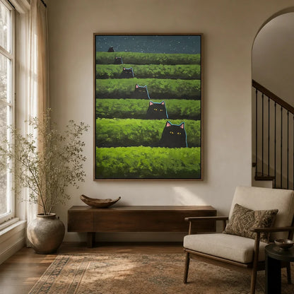 Whimsical black cat canvas wall art hanging in a warm neutral entryway above a wooden console
