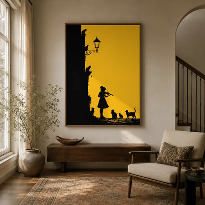 Golden yellow cat and violinist silhouette framed canvas hanging in a bright entryway with arched doorway and armchair