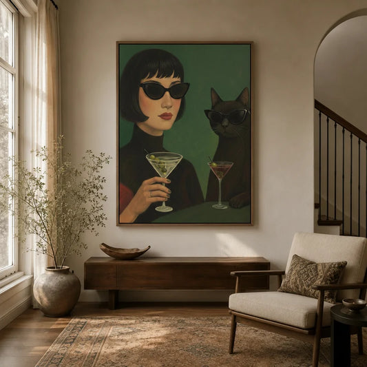Retro woman and black cat martini wall art in walnut floater frame, displayed in warm neutral entryway