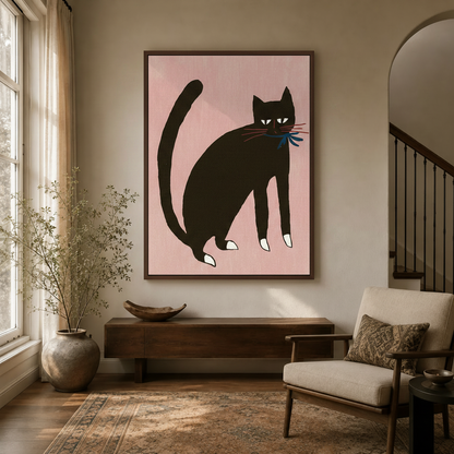Folk art black cat wall art in walnut float frame displayed in bright entryway with arched doorway