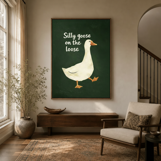 Funny goose canvas print in float frame hanging in neutral entryway with dried botanicals and arched doorway