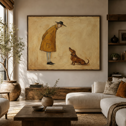 Framed dachshund wall art above a cream sectional sofa in a warm, earthy living room.