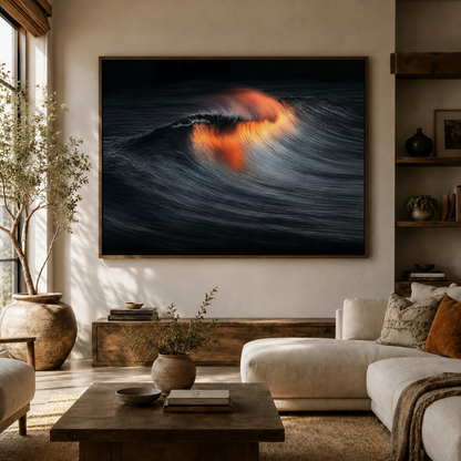 Dramatic navy wave wall art with amber backlight hanging in modern living room above sofa