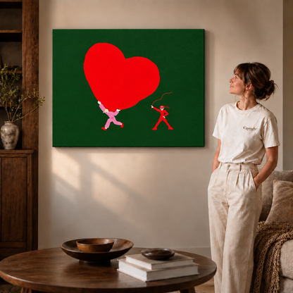 Unframed red heart canvas with two tiny figures displayed in a living room.