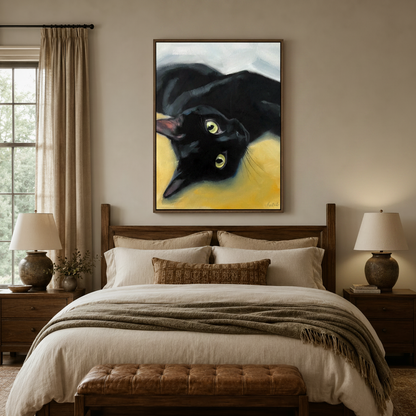 Close-up black cat green eyes realistic portrait canvas framed above dark walnut headboard in warm neutral bedroom