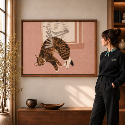  a walnut framed print of a calico cat leaping through a window on a pink background