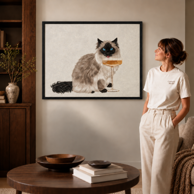 Playful champagne cat painting in a black frame, fluffy cat wall art in a cozy neutral living space.