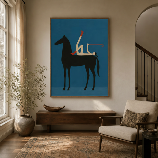 Playful horse rider blue minimalist canvas wall art in walnut frame above console table in warm neutral entryway