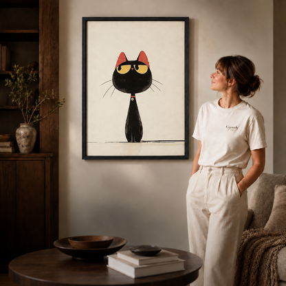 Minimalist black cat wall art framed above a console table in a neutral-toned living room.